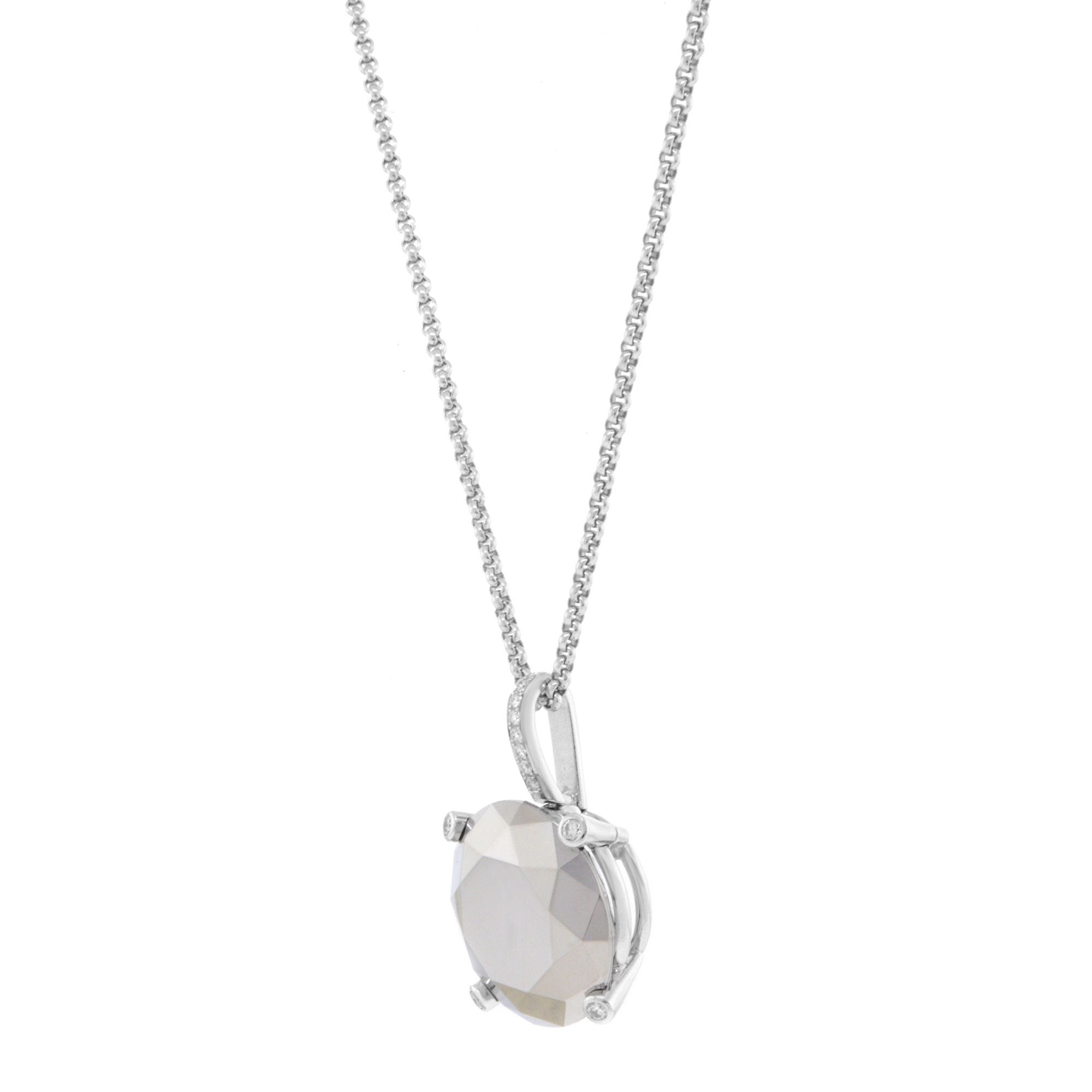An image of a Chopard necklace featuring diamonds and chrome stone gemstone, designed for women. The necklace is shown from a slight side angle, focusing on the pendant. The large, faceted gemstone is set in a prong setting and surrounded by small diamonds, with the chain visible extending upwards. The image is taken at a close distance, highlighting the intricate details of the pendant. Excellent pre-owned condition. 