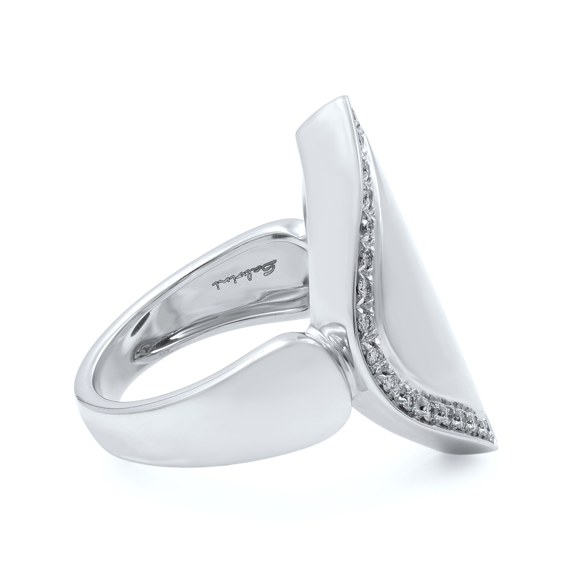 An image of a Salvini brand ring with diamonds designed for women, displayed at a three-quarter angle. The ring is shown centered in the frame, with a close-up view that highlights the smooth, shiny 18k white gold band and the channel of sparkling diamonds set along one edge. The intricate details of the diamonds' cut and setting are visible, reflecting light to emphasize their clarity and brilliance. The background is a pure white, ensuring the focus remains on the elegant craftsmanship of the jewelry piece.