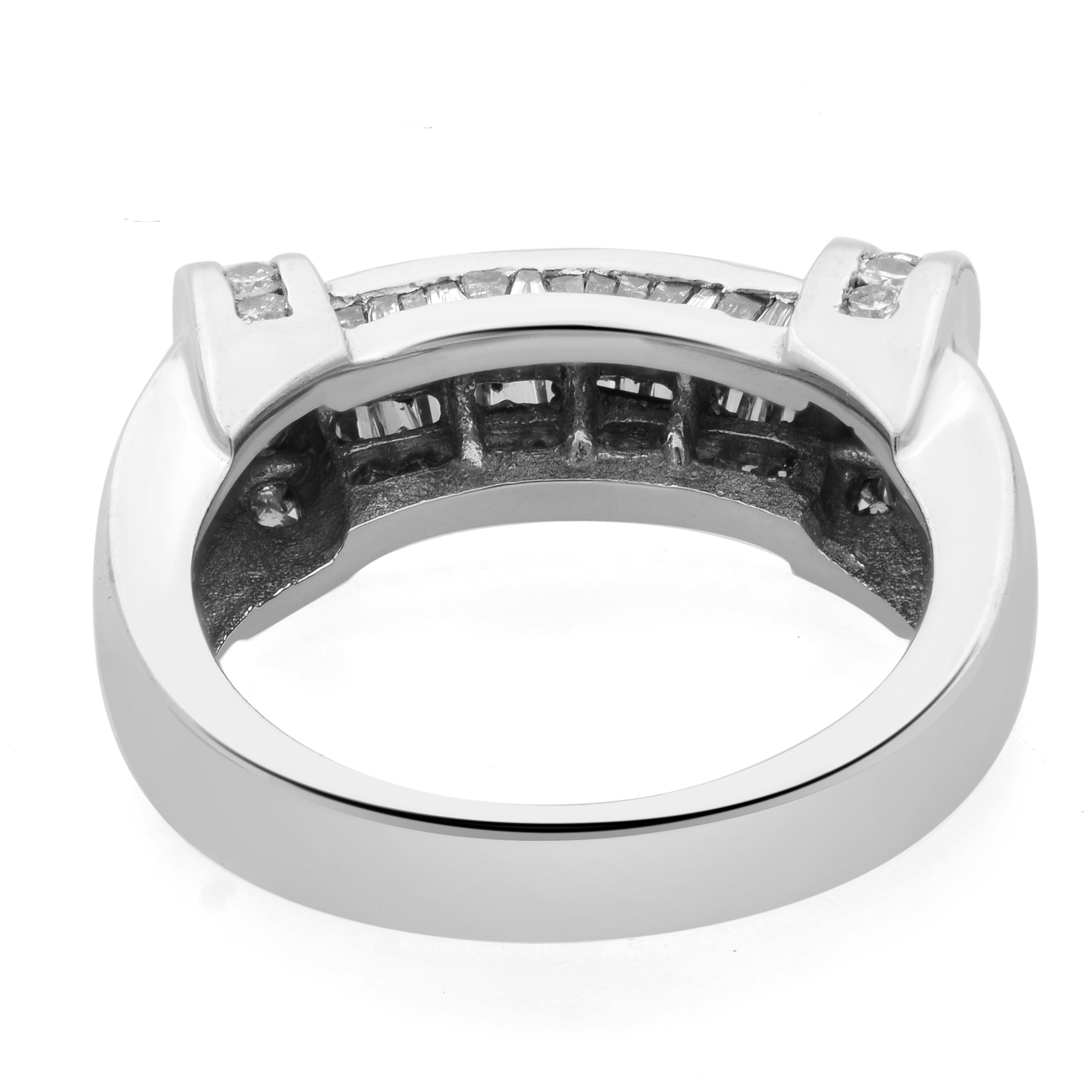 An image of a women's Rachel Koen brand ring with diamonds, shown in a close-up side view. The ring is positioned horizontally with the band's right side slightly closer to the viewer, emphasizing the channel-set diamonds along the upper part of the shank and a larger diamond set at each end of the channel. The image is taken from a slightly elevated angle, focusing on the sparkle and design of the ring against a white background.The ring is pre owned in a great condition.