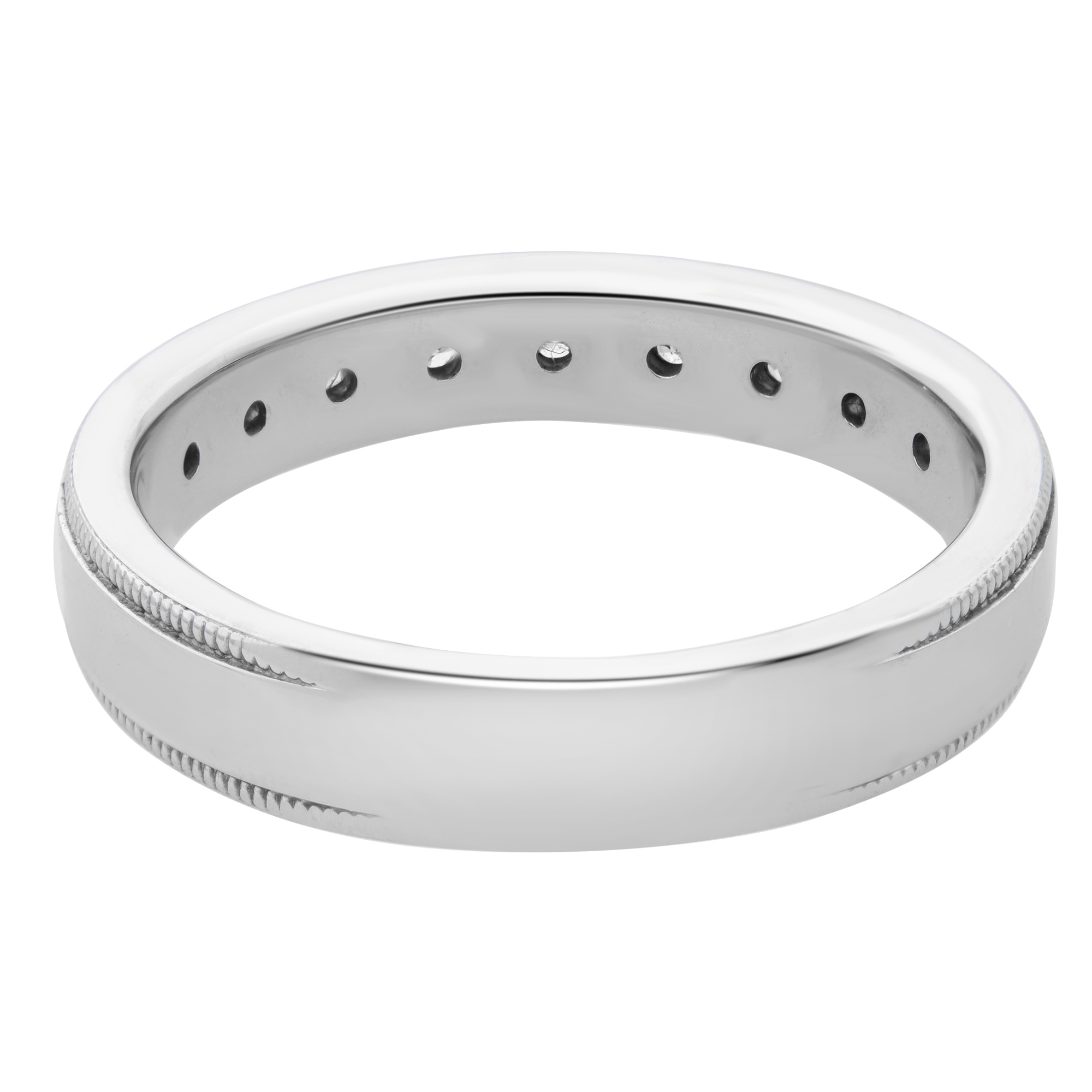 An image of a Rachel Koen brand women's ring with diamonds, displayed in a close-up, side-on view. The ring is positioned horizontally in the center of the frame with a slight tilt, allowing a clear view of the band and the inset diamonds. The ring features a smooth, polished surface with milgrain edges and small round diamonds evenly spaced along the top half. The background is a neutral white, emphasizing the ring's design and brilliance.The ring is pre-owned in a great condition. 