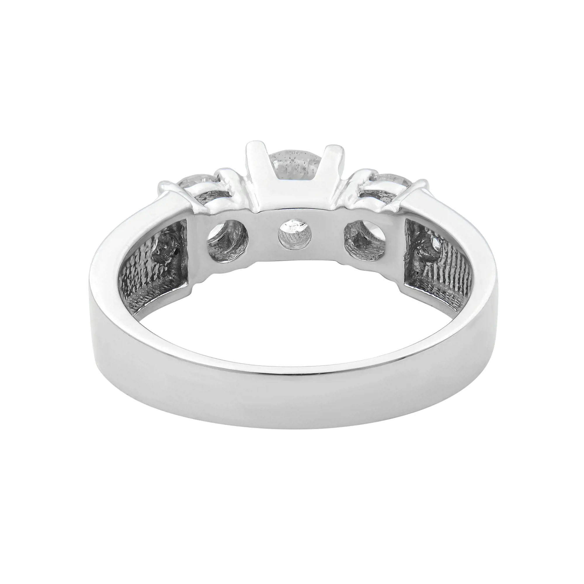 An image of a Rachel Koen women's ring with diamonds, showcased on a close-up, centered view, against a white background. The ring is positioned horizontally with the band's shank visible and facing upwards, allowing clear visibility of the diamonds' setting and the detailed craftsmanship on the side. The diamonds are mounted on the top part of the ring, with the largest stone in the center flanked by smaller stones along the band's span. The perspective is a slight top angle, emphasizing the stones' cut and the ring's polished surface.The ring is pre-owned in a great condition. 