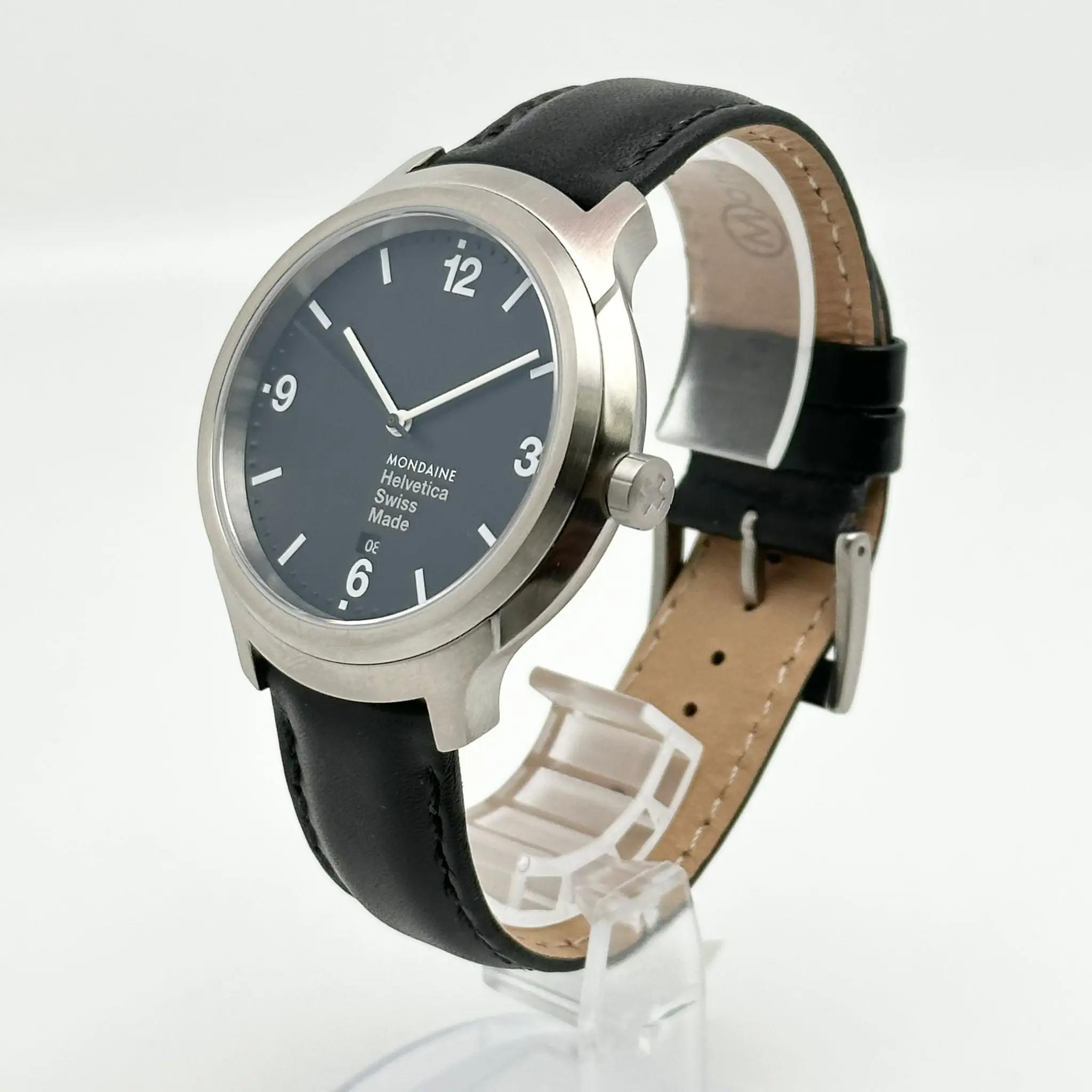 View Of Crown Facing Side Of Mondaine MH1.B1220.LB Stainless Steel Watch Display Model Condition