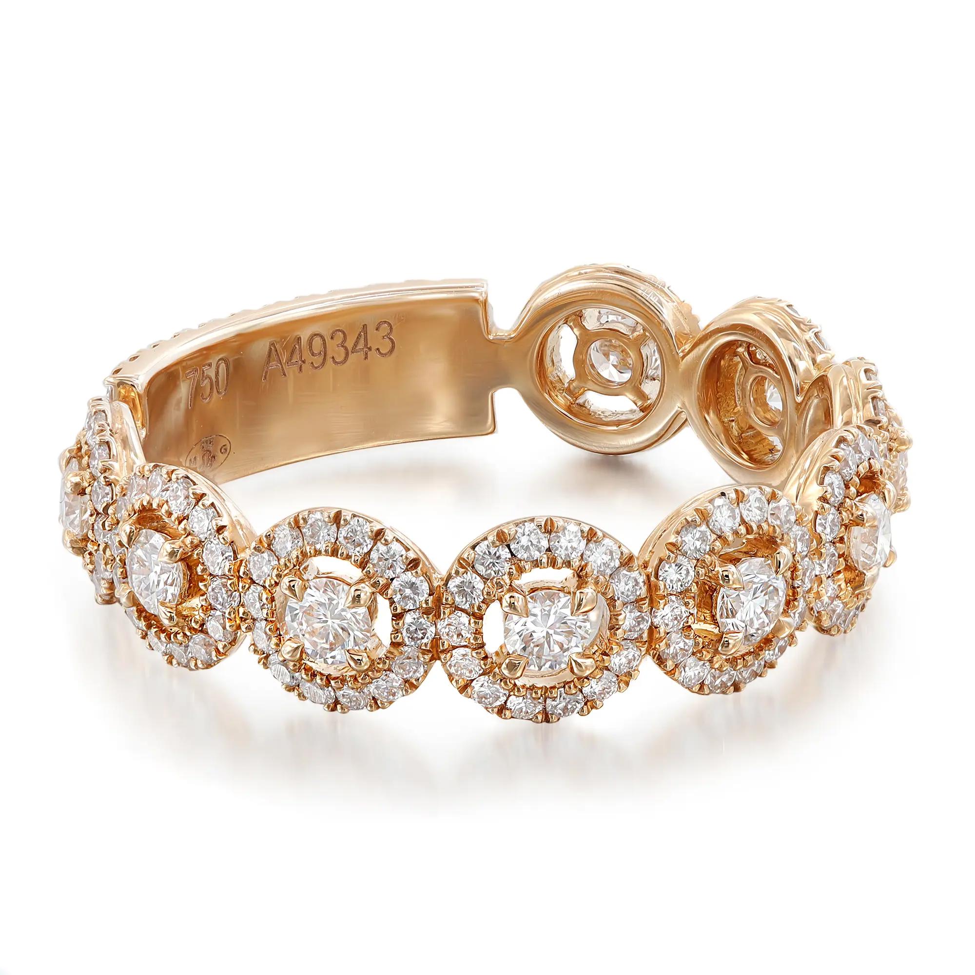 An image of a luxurious Messika women's ring with diamonds, displayed at a slight angle to showcase the intricate design. The ring features a series of connected oval shapes, each encrusted with multiple sparkling diamonds set in a warm, rose gold band. The band has a polished finish with hallmarks visible, and the diamonds catch the light beautifully. The photo is taken from a close distance, highlighting the ring's detailed craftsmanship and the brilliance of the stones.