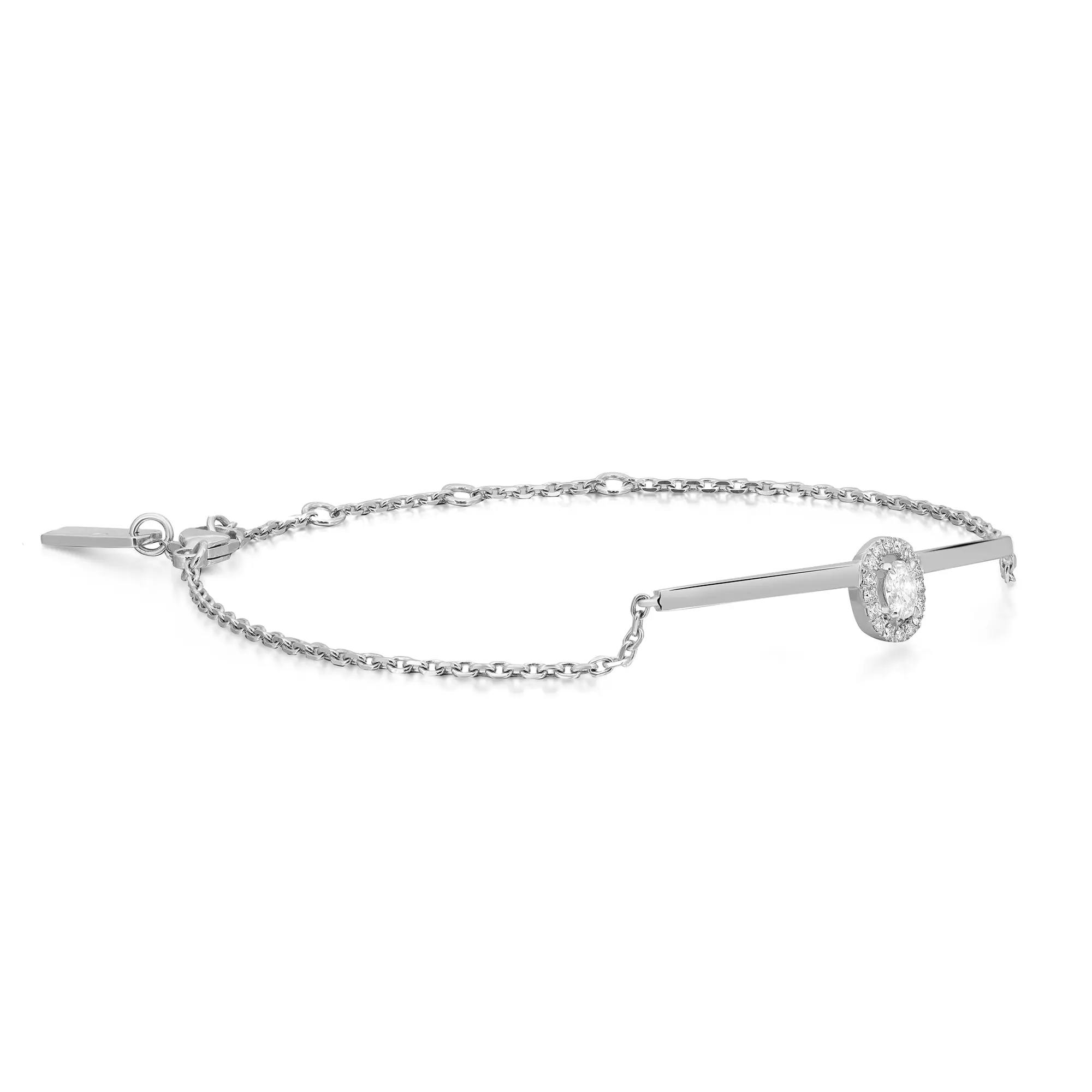 An image of a Messika women's bracelet with diamonds, positioned centrally against a white background. The bracelet is displayed in a slight diagonal angle from the top left to the bottom right of the frame, with a medium distance allowing clear view of the design features. The diamonds are concentrated on a circular charm at one end of the bracelet, which is connected to a delicate chain.