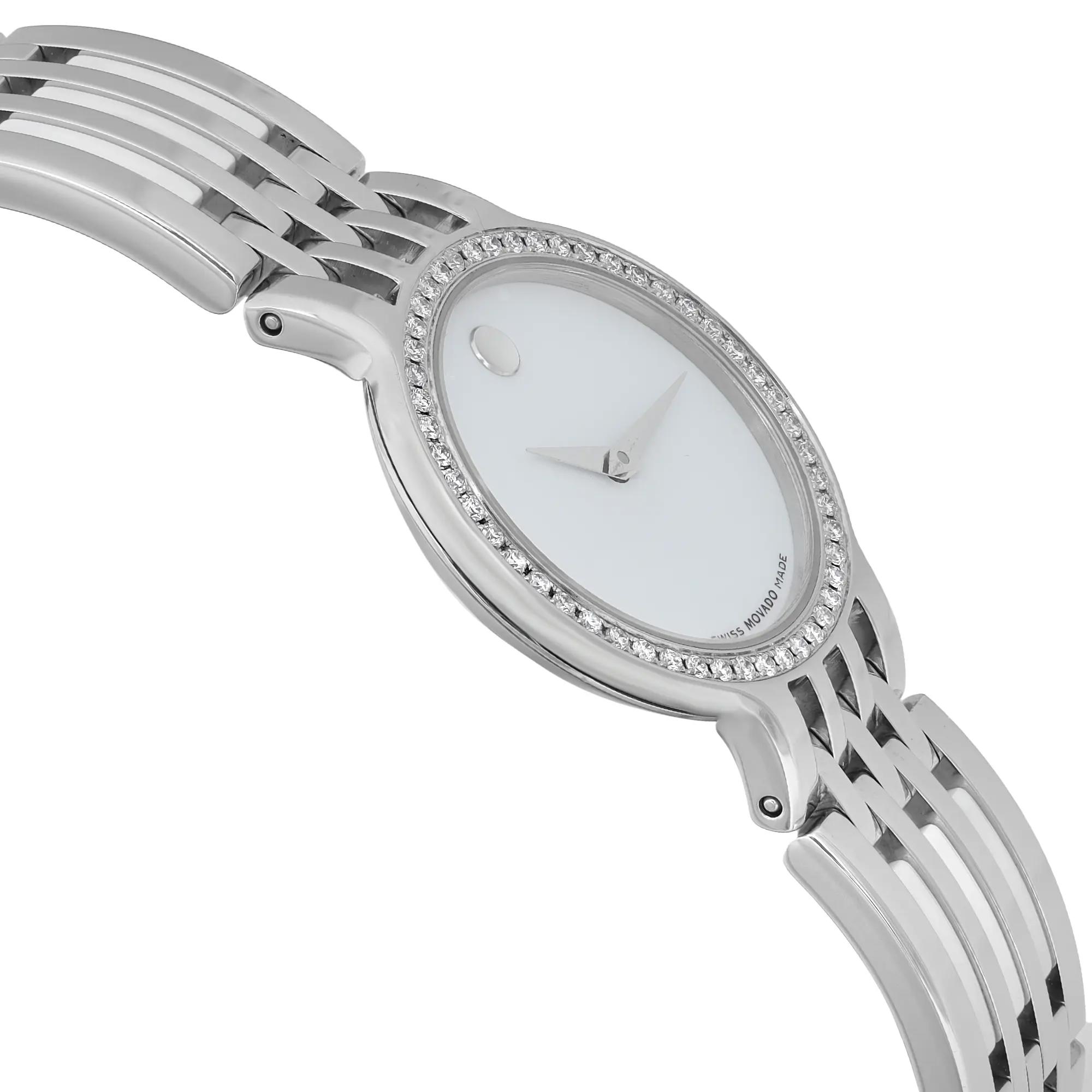 An image of a pre-owned Movado women's wristwatch in a casual style, shown from a side profile view opposite the crown. The watch features a round, white dial and a gray bezel. The band is composed of ceramic and stainless steel, while the case is made of stainless steel. The angle highlights the sleek design and materials, captured at a close distance.
