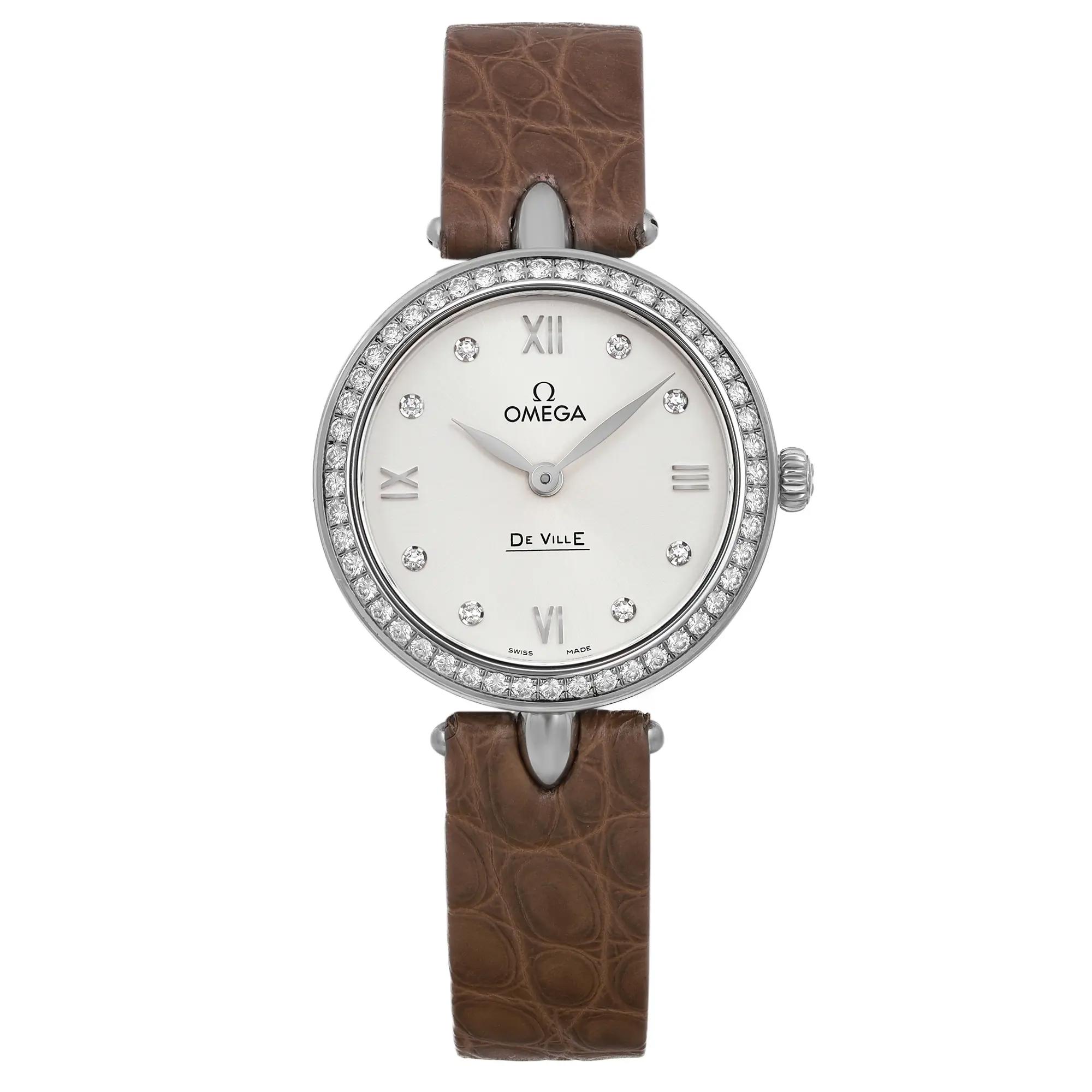 An image of a front full frontal view of a display model OMEGA wristwatch for women in a casual style. The watch features a silver dial with diamond markers at each hour position and Roman numerals at the 12, 3, 6, and 9 o'clock positions. The round case is made of stainless steel with a gray bezel adorned with multiple small diamonds. The band is crafted from brown leather with a visible textured pattern. The watch is positioned centrally in the frame, with the band partially folded behind the watch, allowing a clear view of the dial and case from a direct angle and close distance.