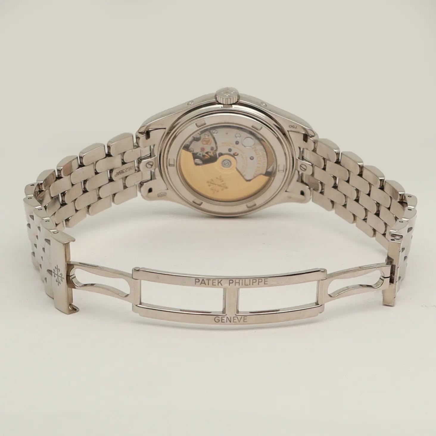 Back View Of Exhibition Back Case And Open White Gold Band Of Patek Philippe 5146/1G Watch Pre Owned Condition